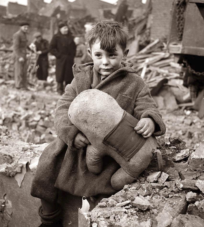 Young+English+boy+and+stuffed+animal+after+bombing,+1945.jpg