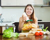 woman-cooking-sandwiches-mayonnaise-sauce-happy-kitchen-46129076.jpg