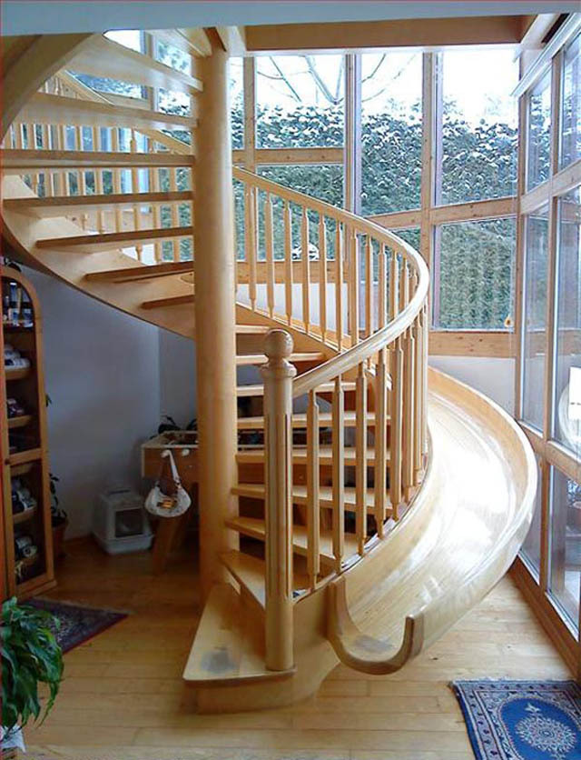 wooden-spiral-staircase-with-slide-beside-it-3.jpg