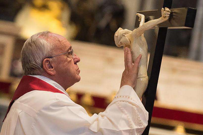 Pope_Francis_venerates_the_Cross_on_Good_Friday_2015_Credit_LOsservatore_Romano.jpg