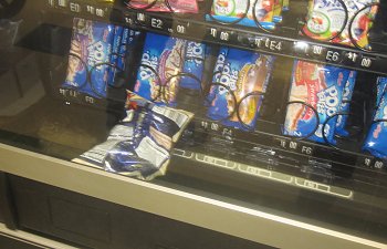 bag_of_chips_stuck_in_vending_machine_by_metalgriffen69-d4xrw8u.jpg