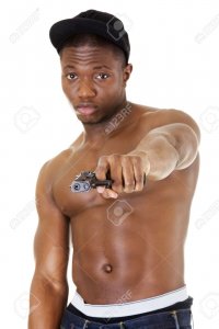 22466369-afro-american-man-standing-with-gun-in-hand-thug-and-gangsta-concept-.jpg