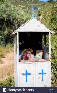 greek-ikons-inside-roadside-shrine-E6RRNJ.jpg