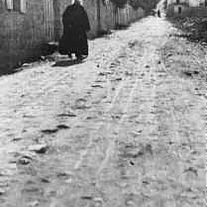 A photo of Abdul-Baha walking down a street in Haifa in the early twentieth century
