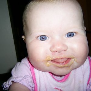 She gets more food on her face then in her tummy lol