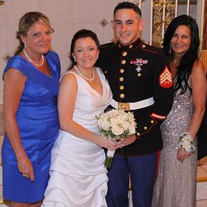 My son's wedding 7/2011 with his new bride and her Mom