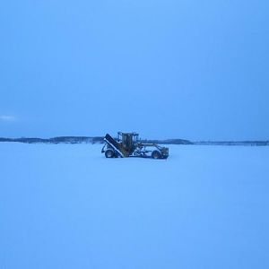 The tractor that plows the ice road!