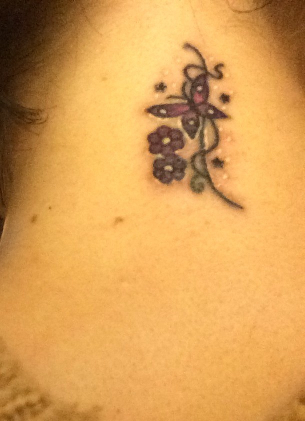 Butterfly neck tattoo