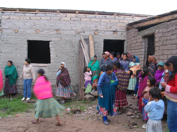 Gathering at their community center to greet us. Word is passed by foot, a child runs around to the other houses to inform the others of visitors. It's rare for them to have means of transportation, they usually walk, and for that these people have been called the fastest runners alive.