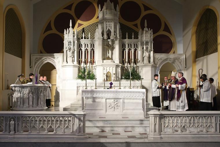 Bishop David O’Connell of the Diocese of Trenton (right) stands beside Father Brian Woodrow on March 30, 2023, during a Mass at which the new altar was consecrated at St. Dominic Church in Brick, New Jersey.  