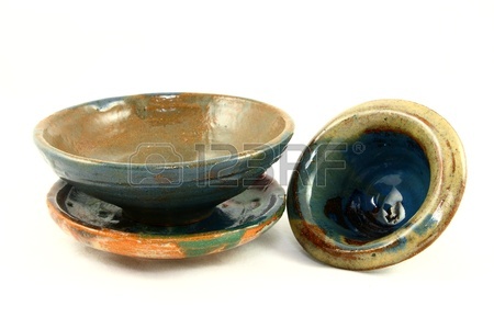 8705903-three-handmade-clay-pots.jpg