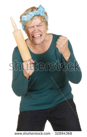 stock-photo-very-aggressive-house-wife-with-roller-pin-32894368.jpg