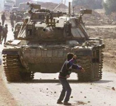 palestinian-kid-throwing-rock-at-israeli-tank2.jpg