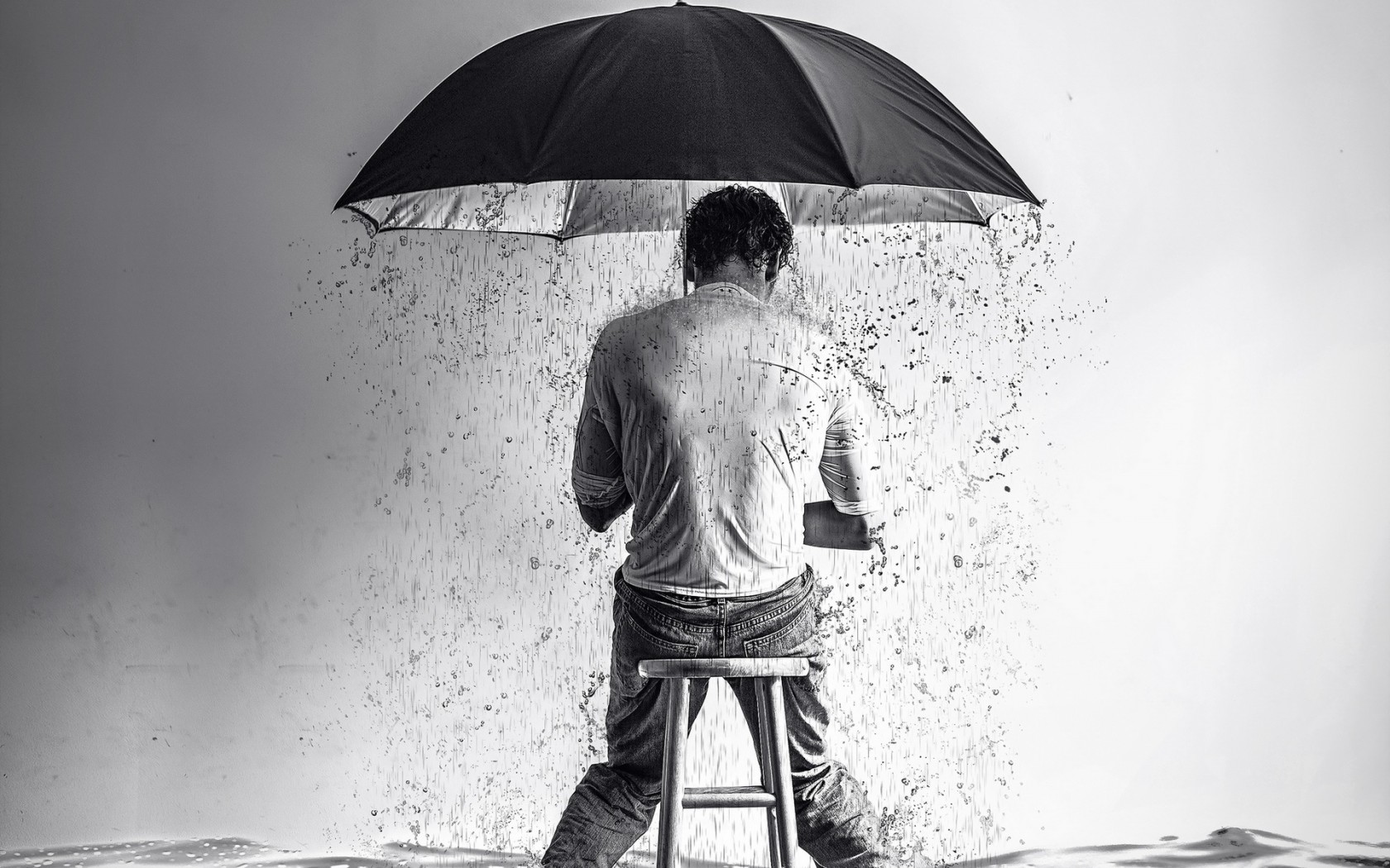 rain-umbrella-man-stool-surreal-picture-photo-black-and-white.jpg