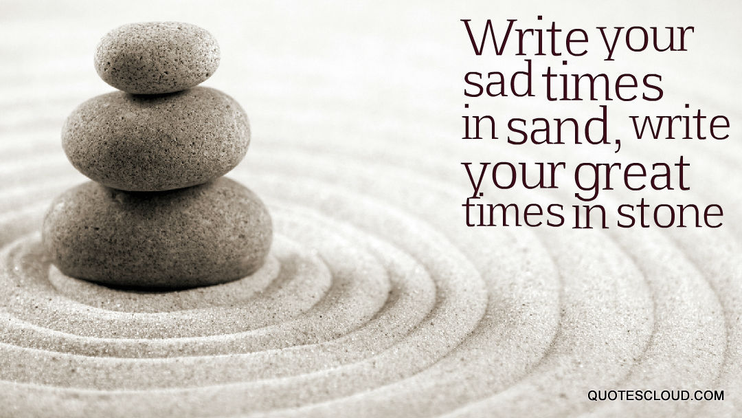 Write-your-sad-times-in-sand.jpg