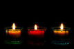 depositphotos_2706001-3-Lit-Candles-bottom-border-on-black..jpg