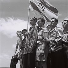 220px-19450715_Buchenwald_survivors_arrive_in_Haifa.jpg