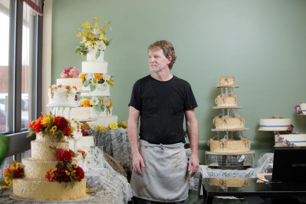 jack-phillips-stands-for-a-portrait-near-a-display-of-wedding-cakes-in-his-masterpiece-cakeshop-in-l_75502_.jpg