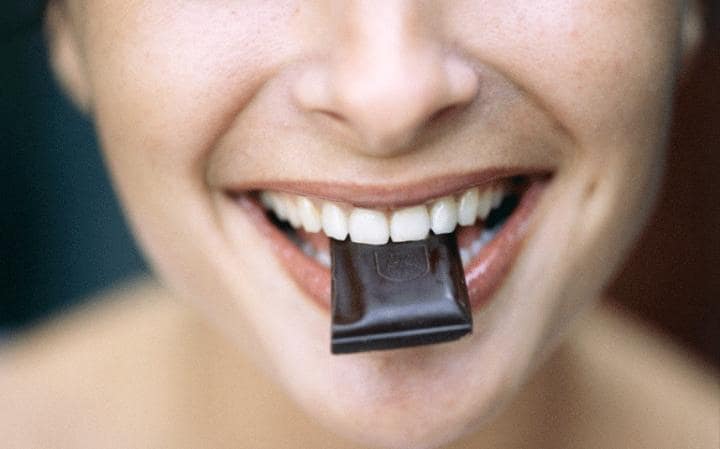 woman-eating-dark-chocolate-large.jpg