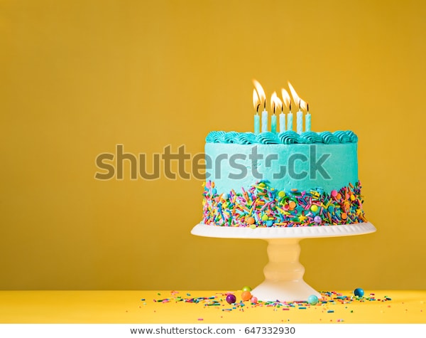 blue-buttercream-birthday-cake-colorful-600w-647332930.jpg