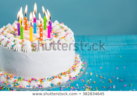 buttercream-birthday-cake-colorful-sprinkles-450w-382834645.jpg