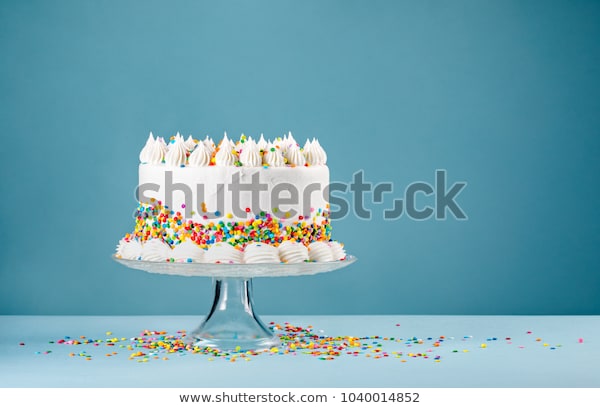 white-birthday-cake-colorful-sprinkles-600w-1040014852.jpg