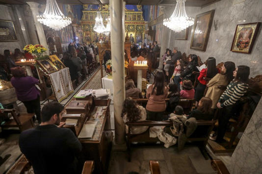 Palestinian Orthodox Christians attend Christmas mass at the Church of Saint Porphyrius in Gaza City on January 7, 2023 [Mohammed Saber/EPA]