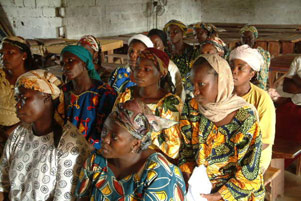 A group of women sitting in a church.