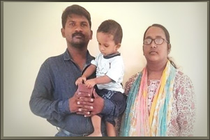 Pastor R. Kirubendran with his wife and daughter.