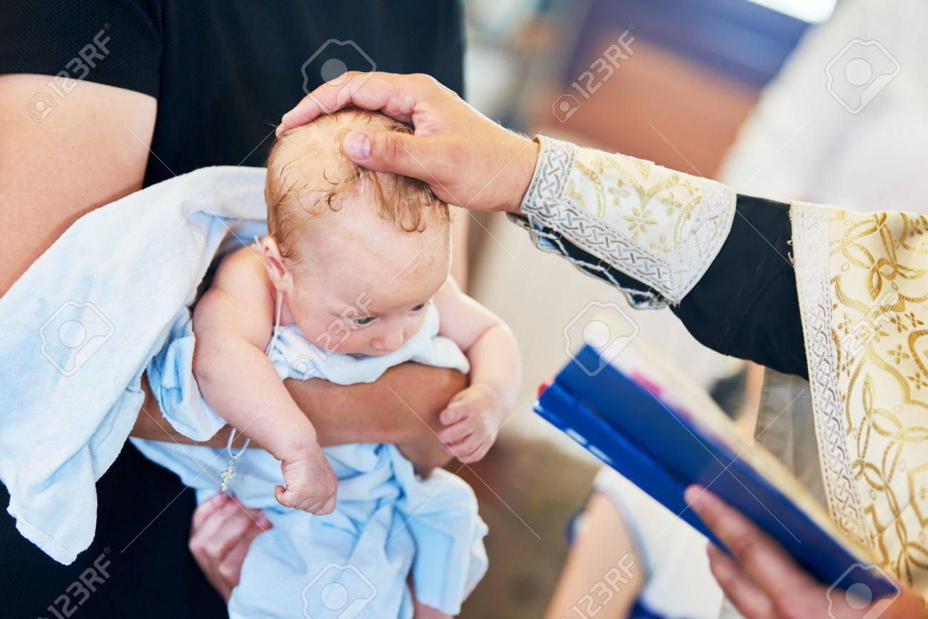 83958137-the-sacrament-of-baptism-newborn-baby-during-christening-and-chrismation.jpg