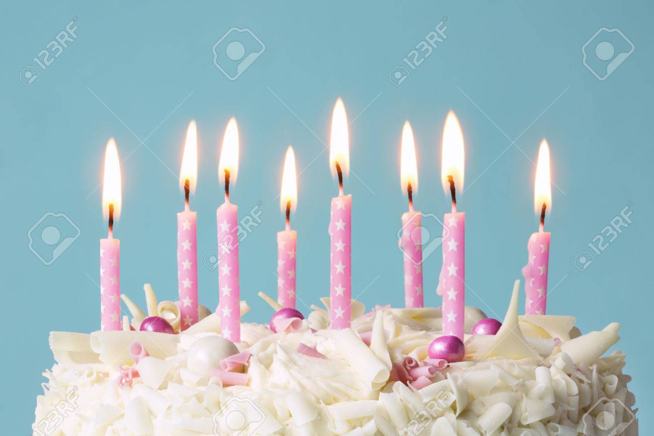 52797989-birthday-cake-with-pink-candles.jpg