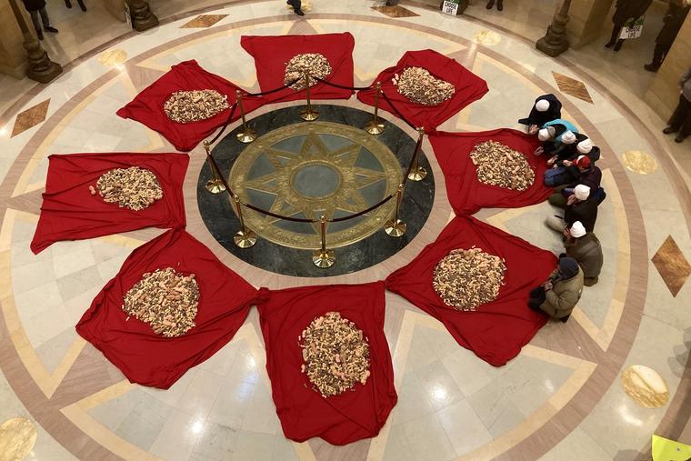 Looking down at the models of unborn babies in the Minnesota Capitol on Jan. 22