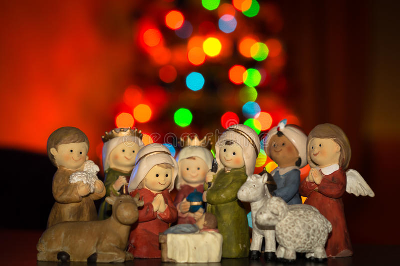 nativity-scene-ceramics-figures-smiley-face-christmas-lights-background-36454873.jpg