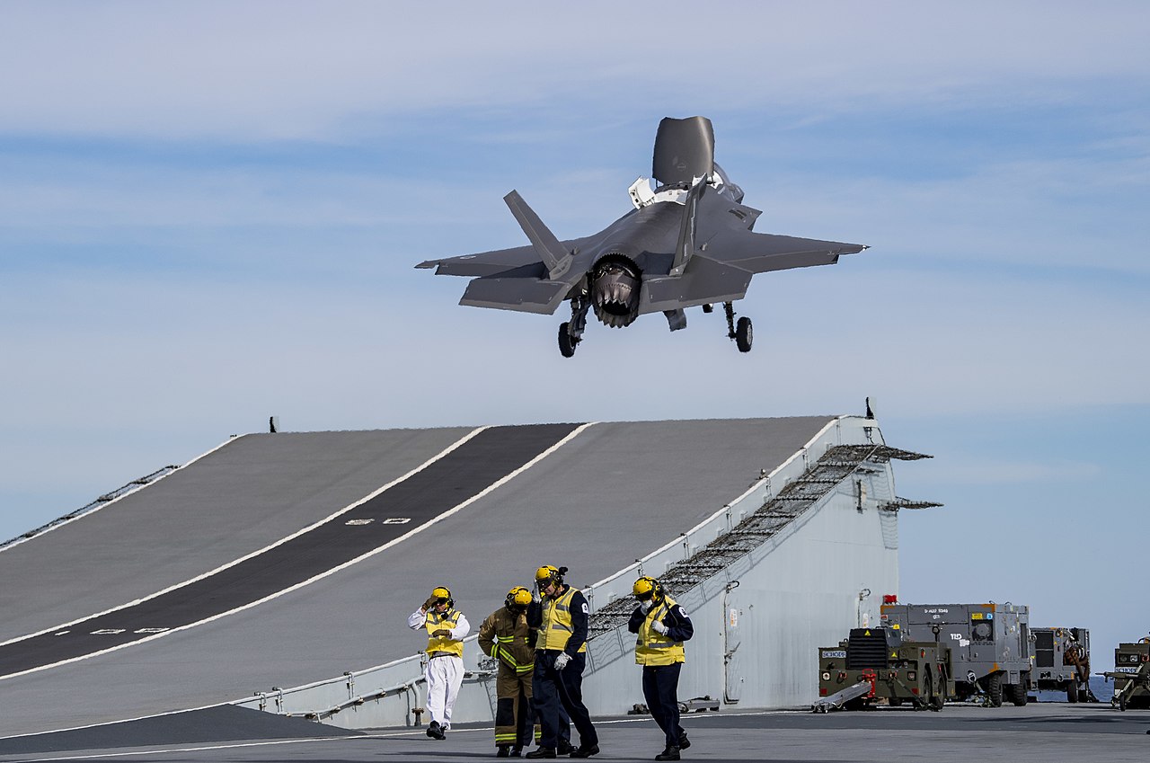 1280px-F-35B_Lightning_II_takes_off_from_HMS_Queen_Elizabeth_%28R08%29_on_17_October_2019_%28191017-N-QI061-1585%29.jpg