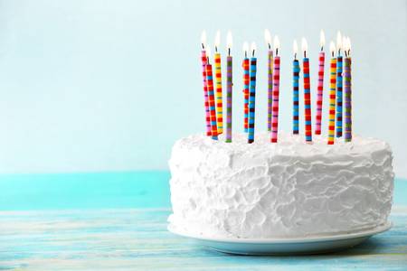 47403884-birthday-cake-with-candles-on-light-background.jpg