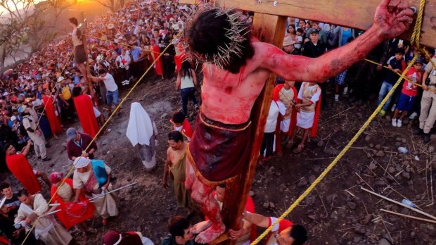 People take part in a performance of The Passion of Jesus Good Friday in San Pedro Tiaquepaque, Mexico, on April 7, 2023