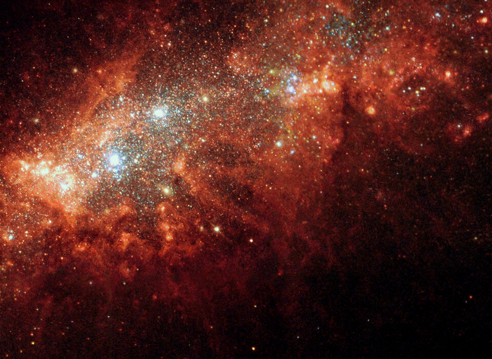 Nearby_galaxy_NGC_1569_is_a_hotbed_of_star_birth_activity_article.jpg