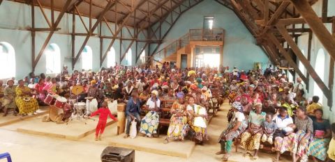 Christians gather inside a large church in the DRC.