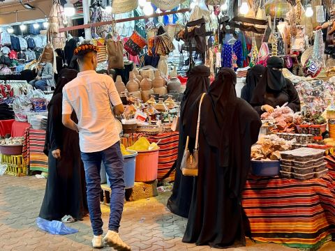 People shopping in an Arab Gulf nation.