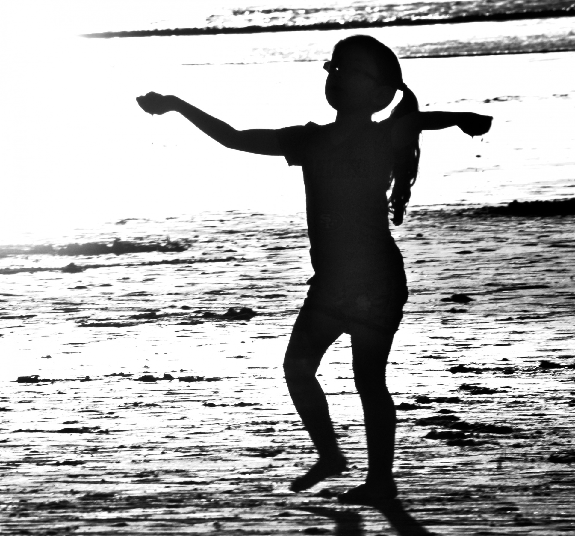 silhouette-of-child-at-beach.jpg