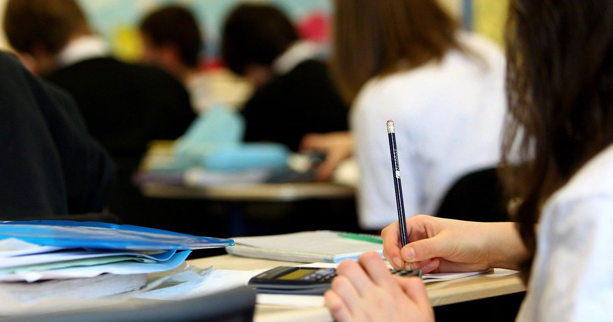 Students sitting in a classroom.